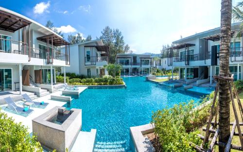 an image of a swimming pool at a resort at The Waters Khao Lak by Katathani - SHA Extra Plus in Khao Lak