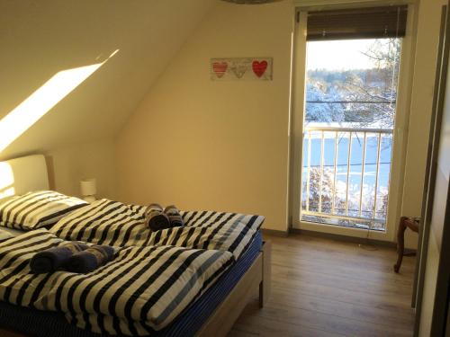 Postel nebo postele na pokoji v ubytování Appartement cosy à Lohr, 45 m² avec parking inclus