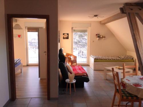 Posezení v ubytování Appartement cosy à Lohr, 45 m² avec parking inclus