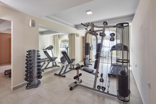 a gym with several exercise equipment in a room at ALKINOI RESORT AND SPA in Monemvasia