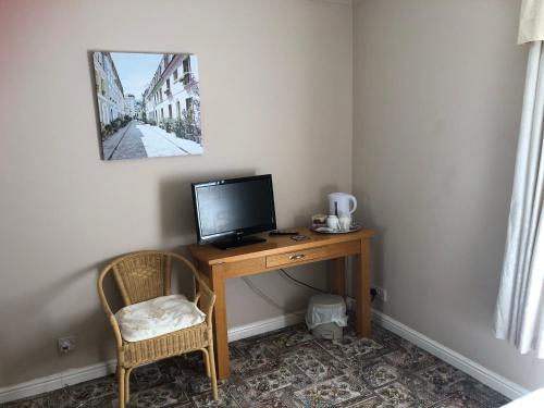Μια τηλεόραση ή/και κέντρο ψυχαγωγίας στο Fairview Bed and Breakfast