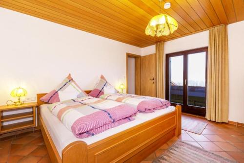 Ένα ή περισσότερα κρεβάτια σε δωμάτιο στο Haus Sonneck Ferienwohnungen GbR