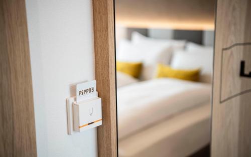 Ένα ή περισσότερα κρεβάτια σε δωμάτιο στο Pippos Mountain Lodge
