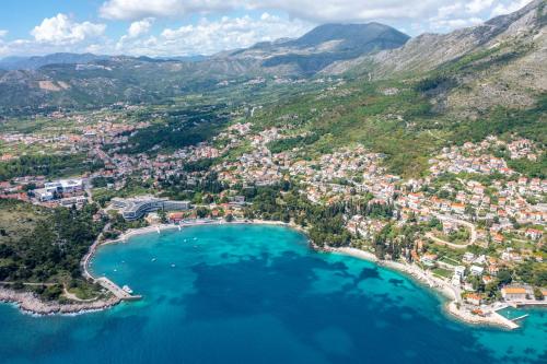 an aerial view of a town on the shore of a beach at Apartments Katica in Mlini