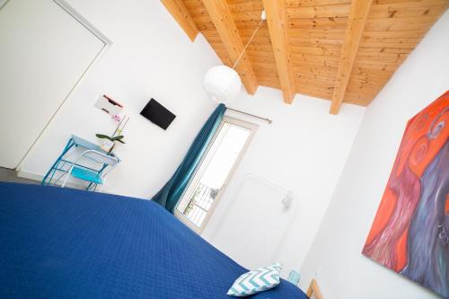 Ένα ή περισσότερα κρεβάτια σε δωμάτιο στο Bed & breakfast La Nassa