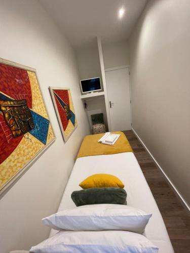 Postel nebo postele na pokoji v ubytování Junqueira76 Guesthouse