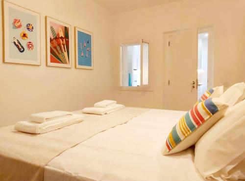 Katil atau katil-katil dalam bilik di Casa do Arco by HnM