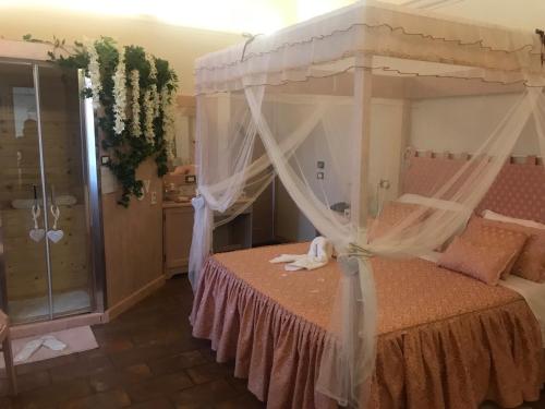 Letto o letti in una camera di Casale Certosa