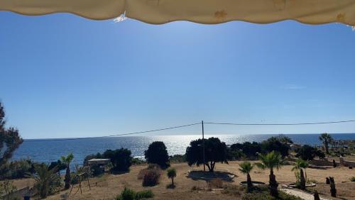 a view of the ocean from a beach at Sea & Sky by Marisa in Petrokhorion
