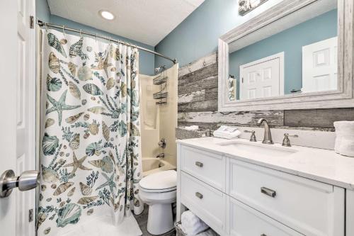 a bathroom with a sink and a toilet and a shower at Panama City Condo w/ Balcony & Pool, Walk to Beach in Panama City Beach