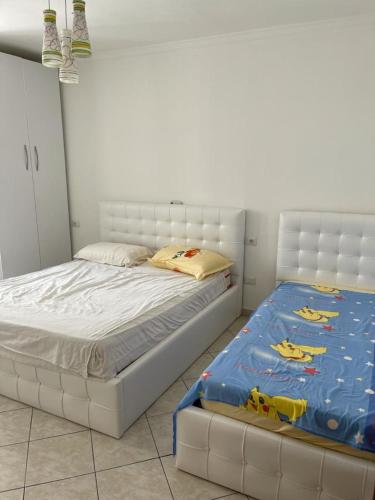 Postel nebo postele na pokoji v ubytování Eldi's Apartment