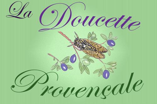 ein Plakat mit einer Biene auf einem Zweig einer Pflanze in der Unterkunft La Doucette Provencale Cozy Nest In Avignon in Avignon