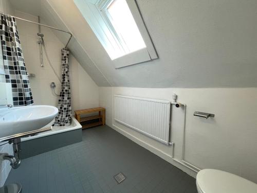 Kylpyhuone majoituspaikassa Schmidt's Gasthof Garni
