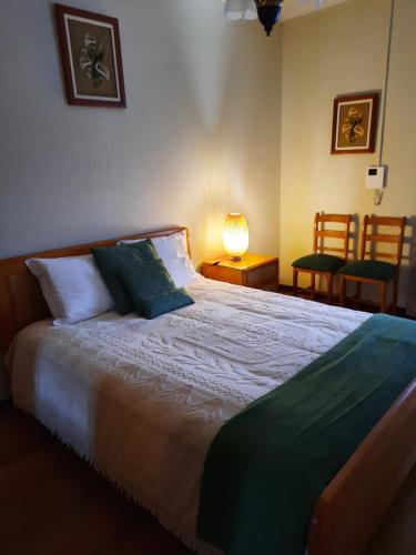Ένα ή περισσότερα κρεβάτια σε δωμάτιο στο Casa Araci
