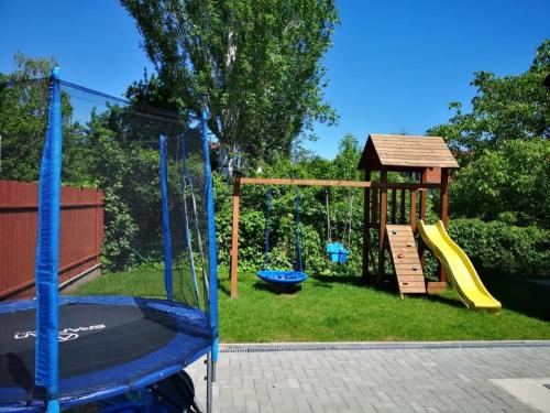 a playground with a slide and a gazebo at No.44 in Balatonfüred