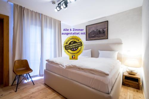 Letto o letti in una camera di Hotel Rote19