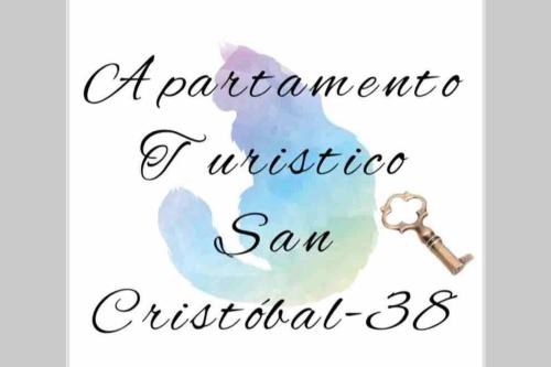 a key to a sanctuary for wildlife sanoriginal stenciled on a white at Apartamento Turistico San Cristobal in Plasencia