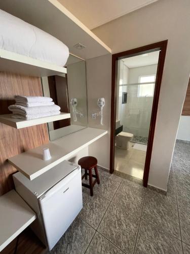 Voodi või voodid majutusasutuse Hotel Araguaia toas