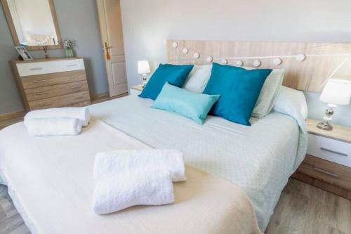 Ένα ή περισσότερα κρεβάτια σε δωμάτιο στο Pablo Neruda Tourist Home