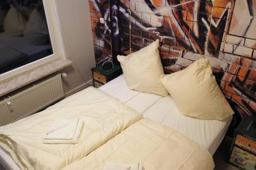 En eller flere senge i et værelse på Penthouse mit Brockenblick App 370