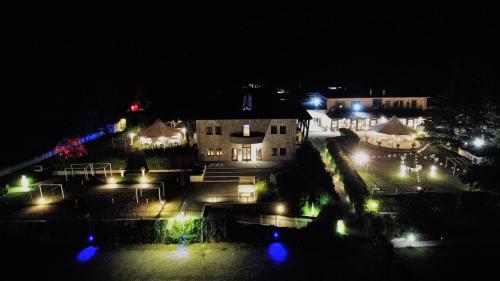a view of a city at night with lights at Sotto Il Cielo Hotel in Pignola