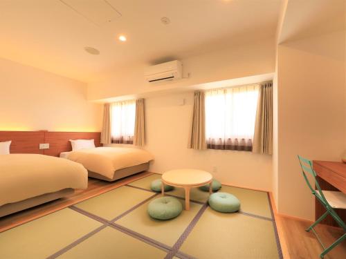 Smile Hotel Miyakojimaにあるベッド