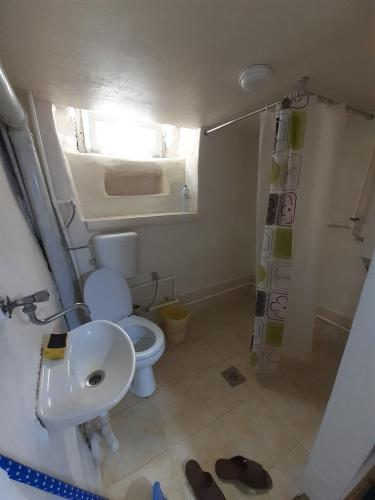 Um banheiro em Bella apartment