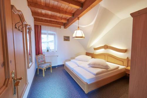 Posteľ alebo postele v izbe v ubytovaní Ferienappartements Rausch