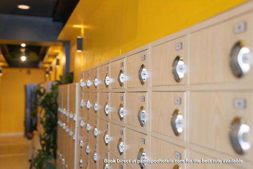 a row of lockers in a gym at Panda Pod Hotel in Richmond