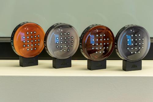 a row of four different lights on a shelf at Hofstede Ter Biest in Zwalm