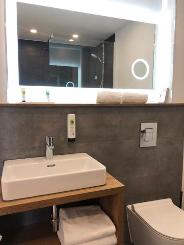Koupelna v ubytování Hotel Kainsbacher Mühle