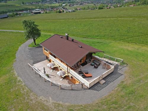 an overhead view of a house with a large deck at STAUDACH - Alpinresidenz Zillertal in Ramsau im Zillertal