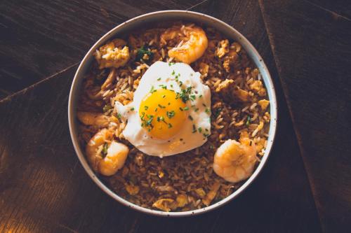 a bowl of food with an egg on top at The White Horse in Shipston on Stour