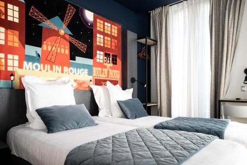 two beds in a hotel room with a clock on the wall at Hôtel Des Arts-Bastille in Paris