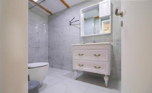 Kylpyhuone majoituspaikassa LIDO APARTMENTS