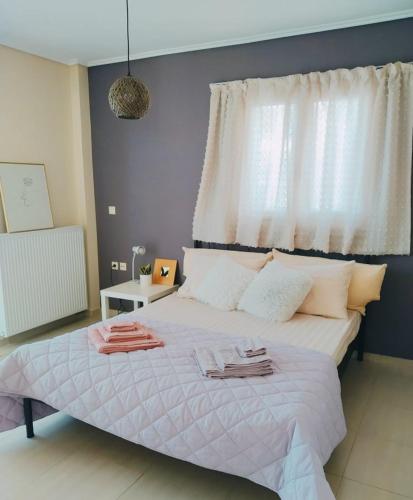 Ein Bett oder Betten in einem Zimmer der Unterkunft Xrysa's Garden