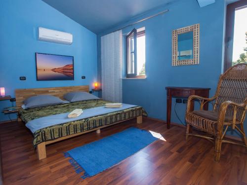 מיטה או מיטות בחדר ב-Villa Hrast Bacva