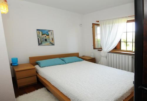 Katil atau katil-katil dalam bilik di Villa Carla
