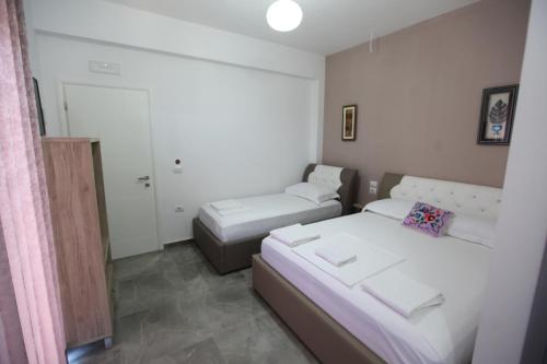Una cama o camas en una habitación de Vila Anhel