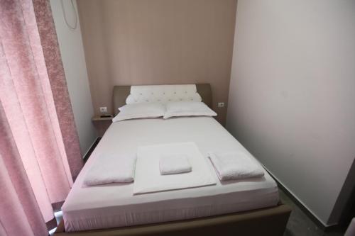 Una cama o camas en una habitación de Vila Anhel
