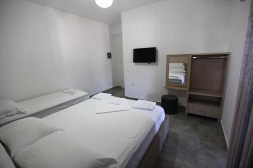 Una cama o camas en una habitación de Vila Anhel