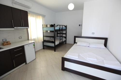 Una cama o camas en una habitación de Vila Anhel