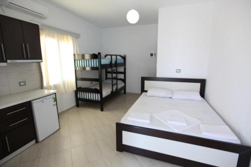 Una cama o camas en una habitación de Vila Anhel