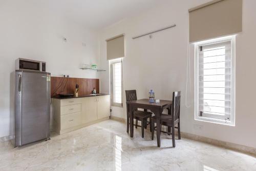 Dapur atau dapur kecil di Olive Service Apartments - Koramangala
