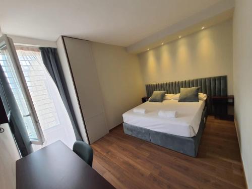 Кровать или кровати в номере Corte Trento - Exclusive Rooms