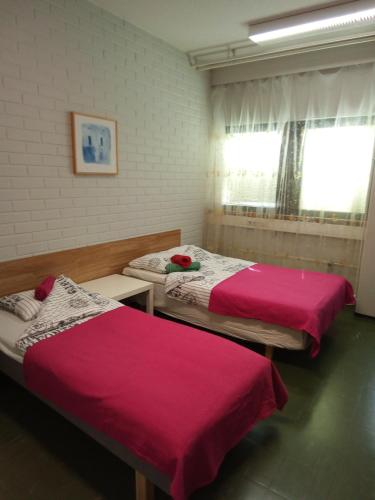 Katil atau katil-katil dalam bilik di Minimotel