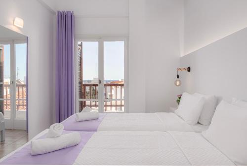 Postel nebo postele na pokoji v ubytování Venus Minimal Hotel