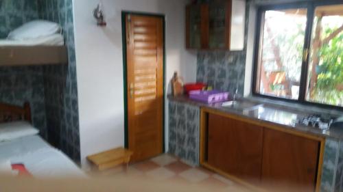 Kuchyň nebo kuchyňský kout v ubytování Magunja