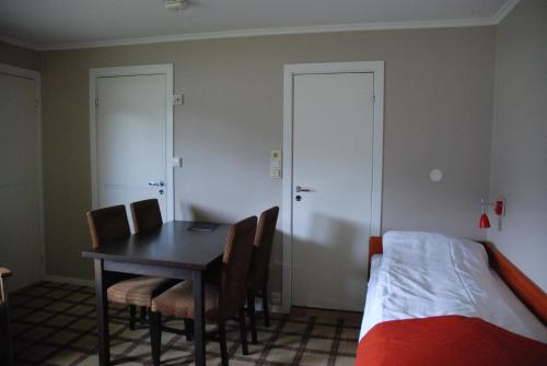 Ένα ή περισσότερα κρεβάτια σε δωμάτιο στο Fleischer's Motel