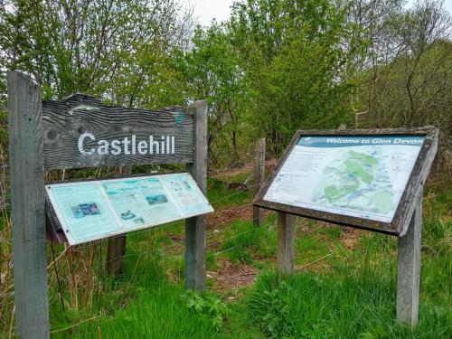 a sign for a trail in a field at Lazy Days Lodge in Glendevon